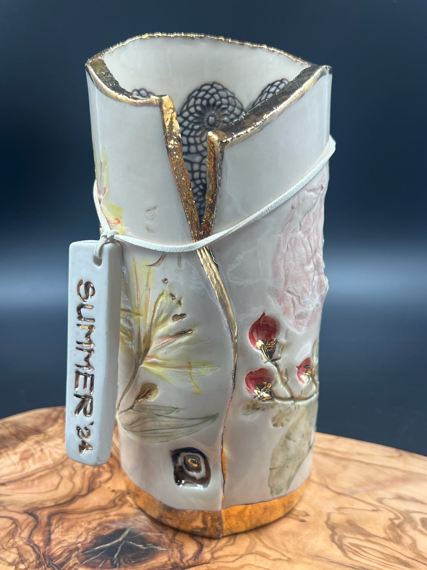 Color floral vase with sepia lace interior and rim