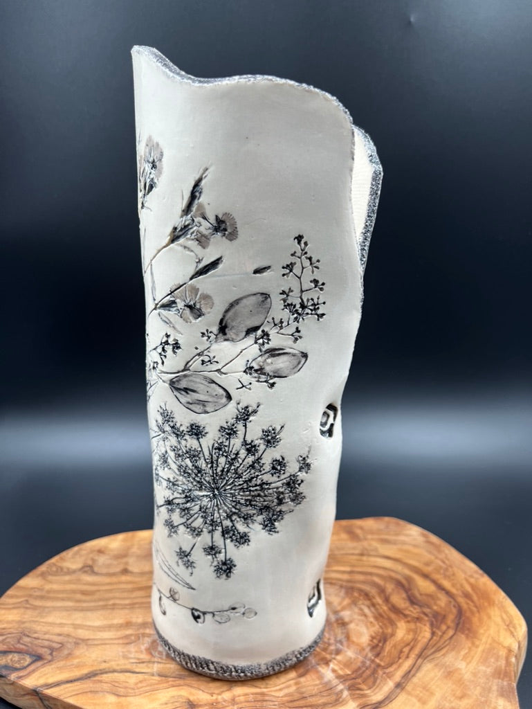 Black floral vase, black rim, tall
