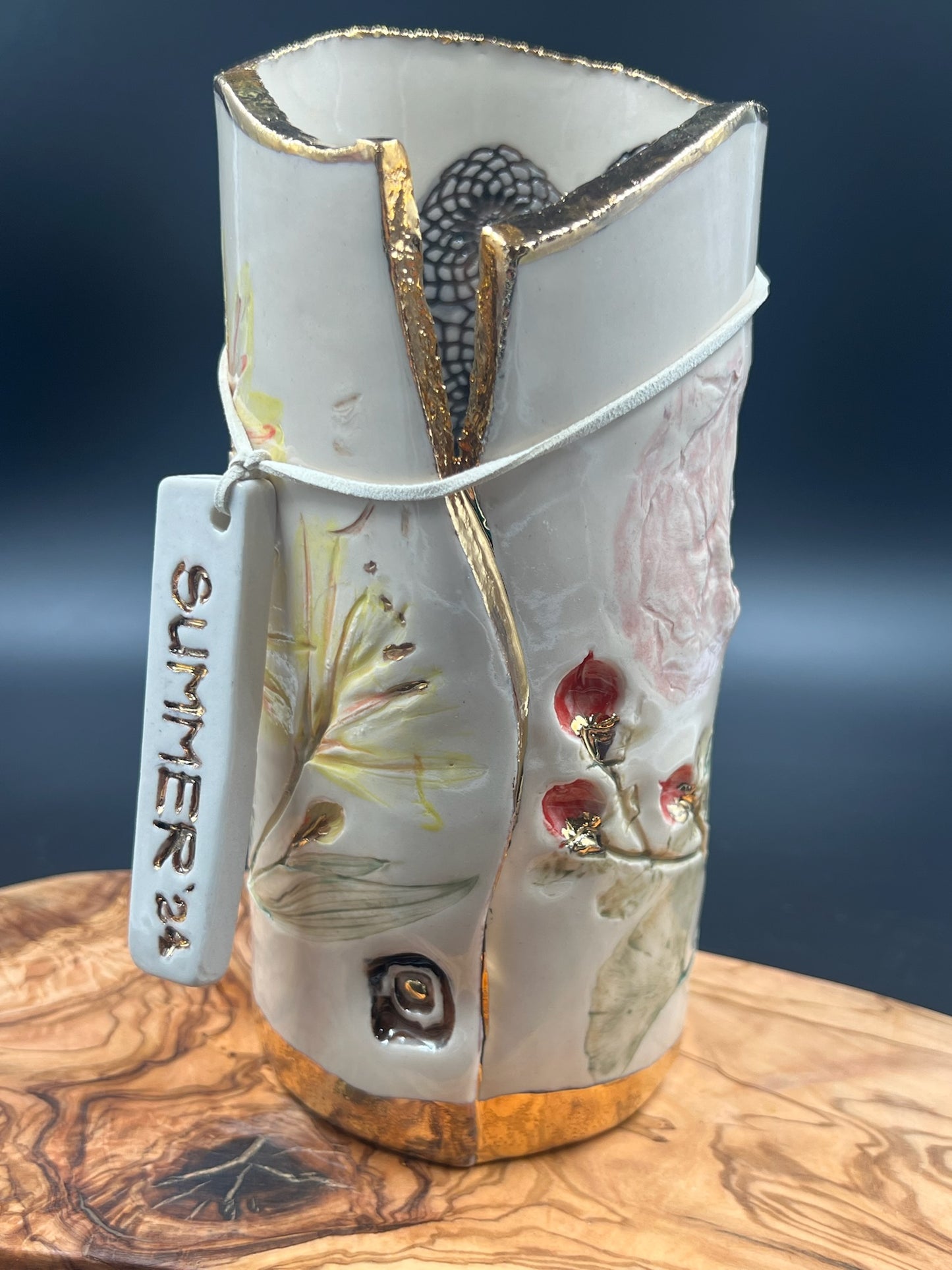 Color floral vase with sepia lace interior and rim