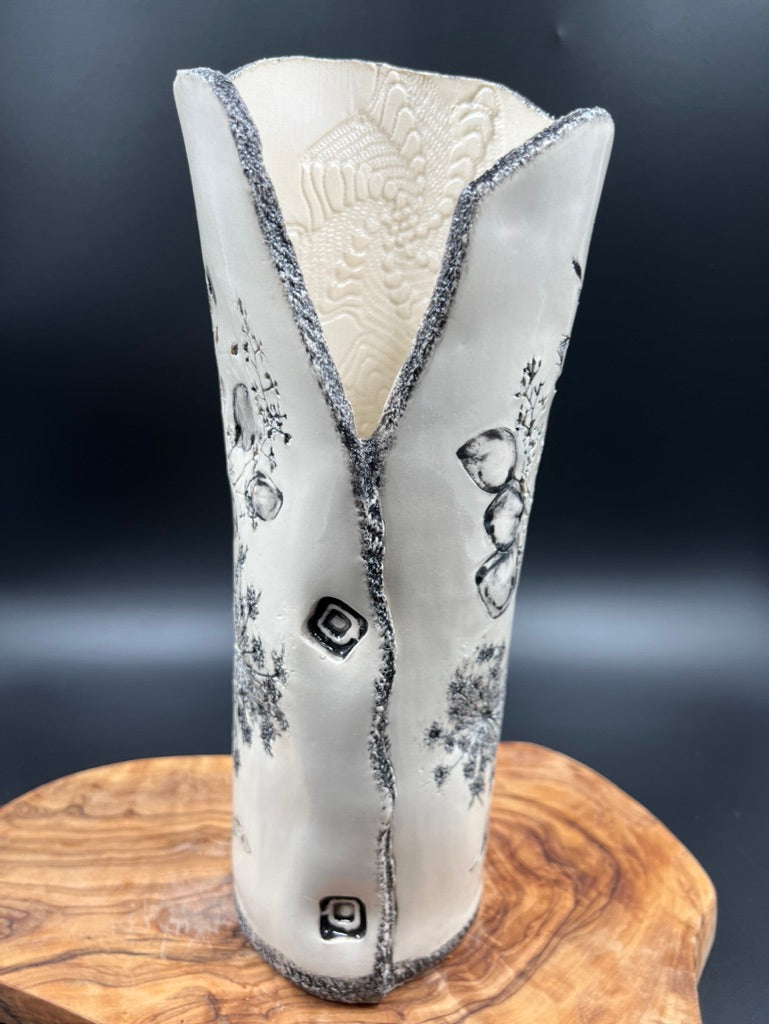 Black floral vase, black rim, tall
