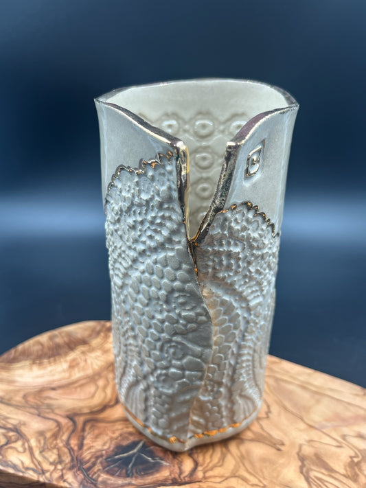 Stone lace vase with gold rim and detail