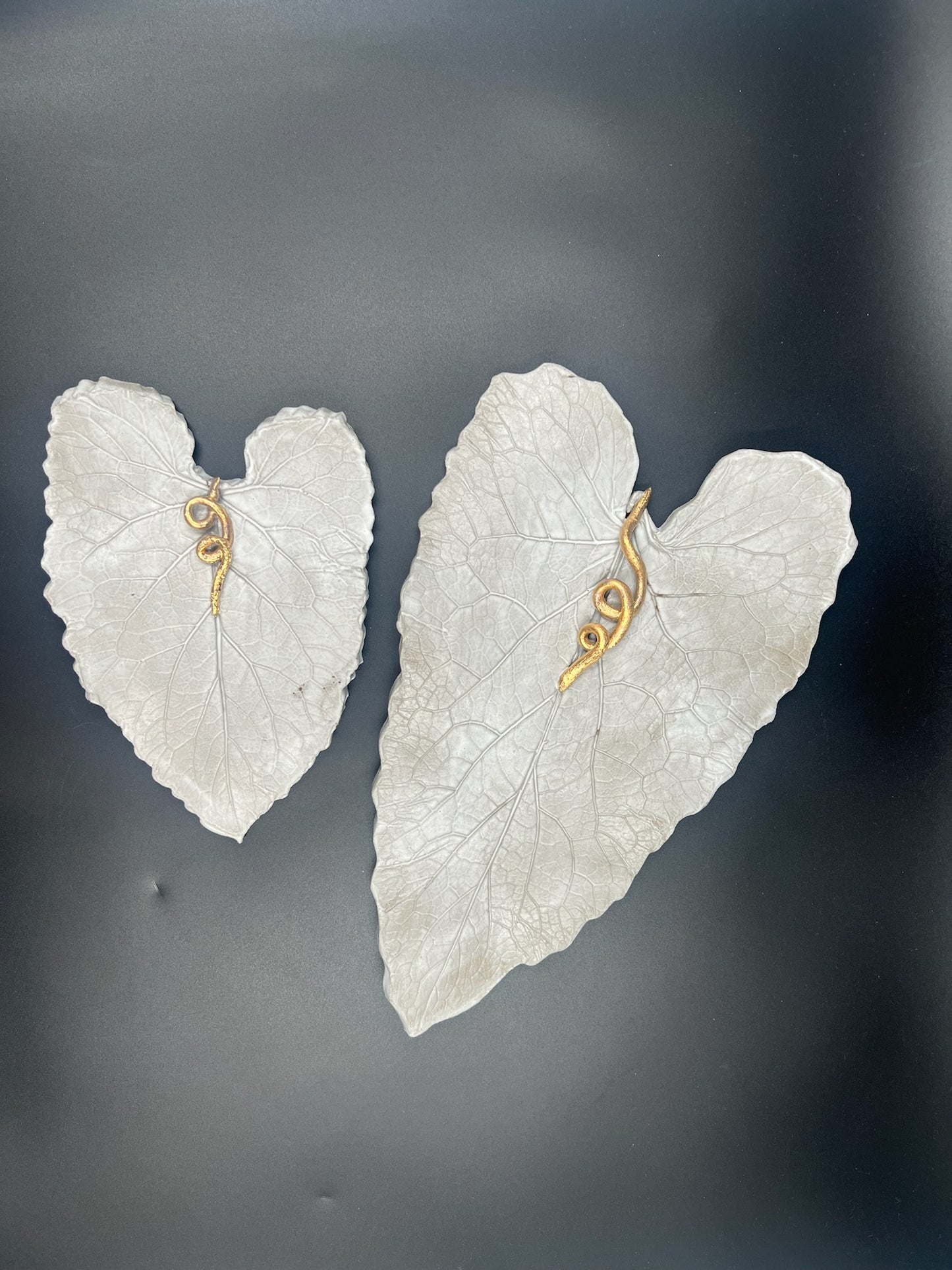 Stone leaf with gold stem