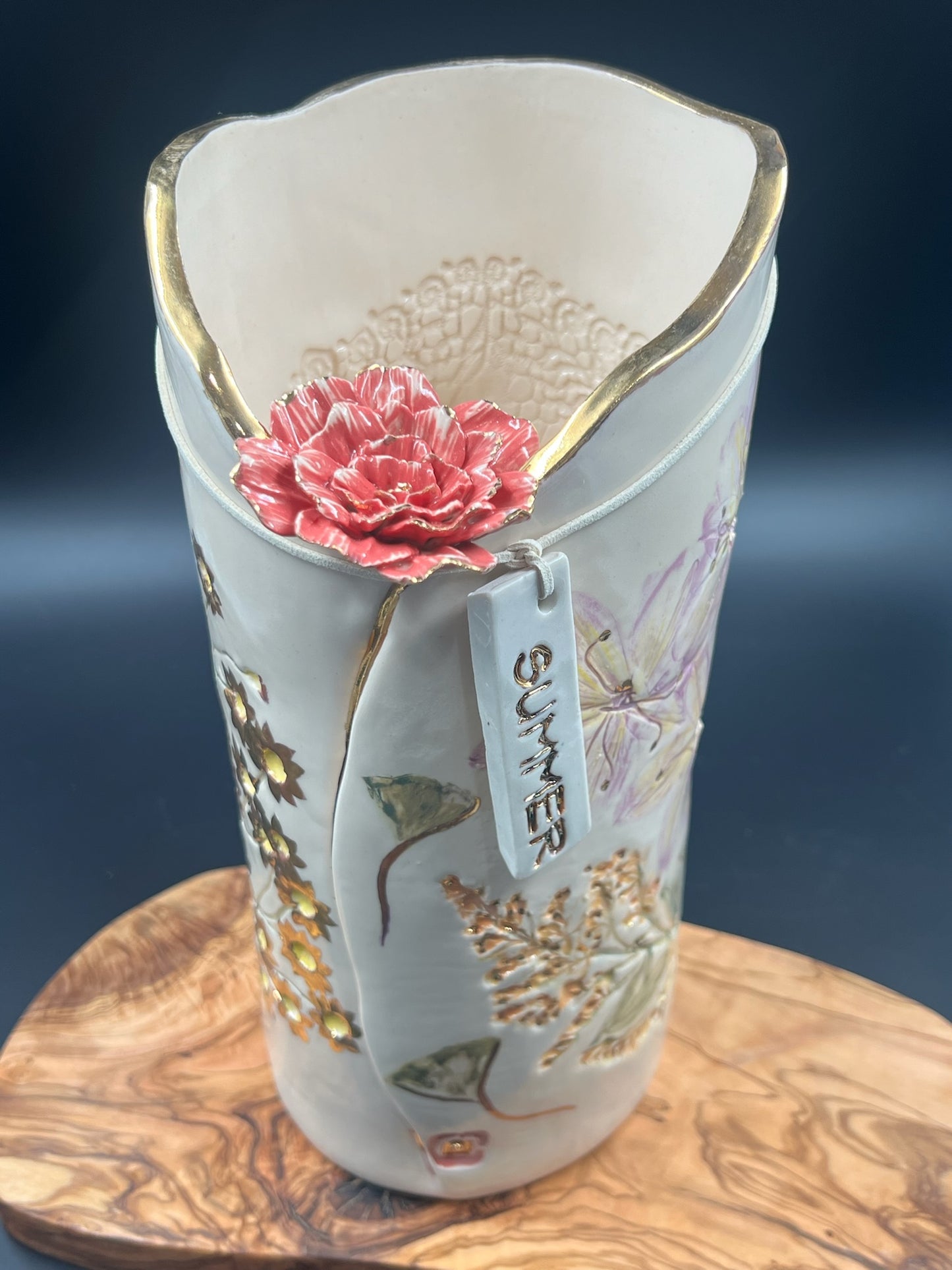 Color floral vase with flower at lip, tall