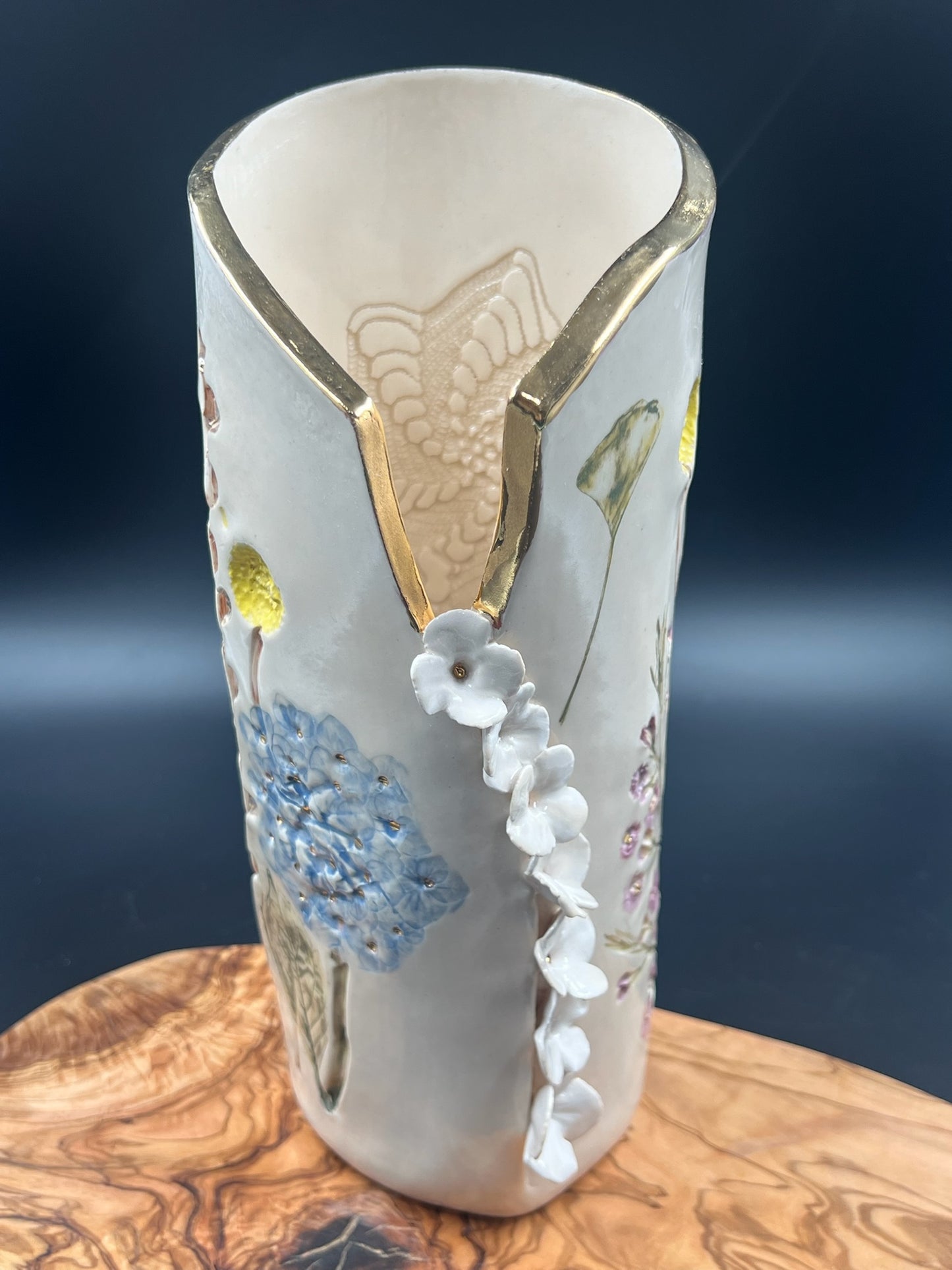 Color floral vase with cascading flowers, tall