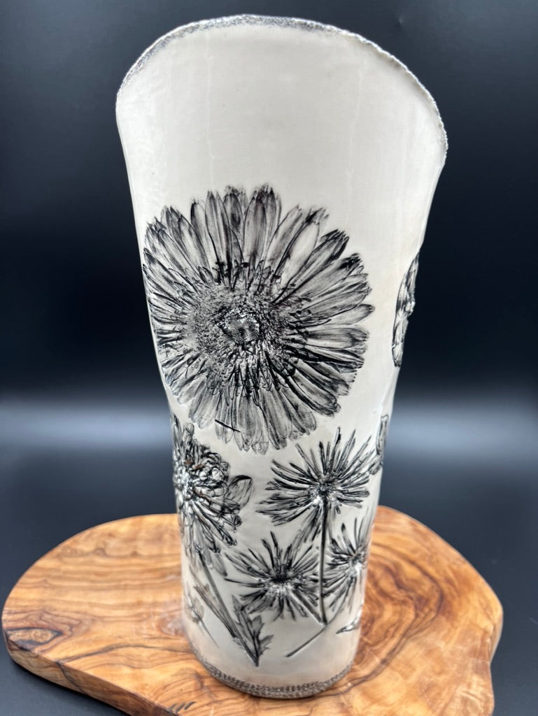 Black floral vase, cascading flowers