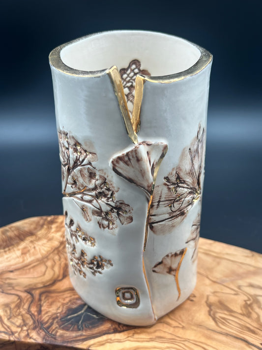 Sepia vase with sepia lace interior and gold rim