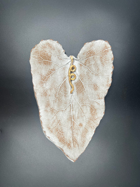 Stone leaf with gold stem and gold dusting