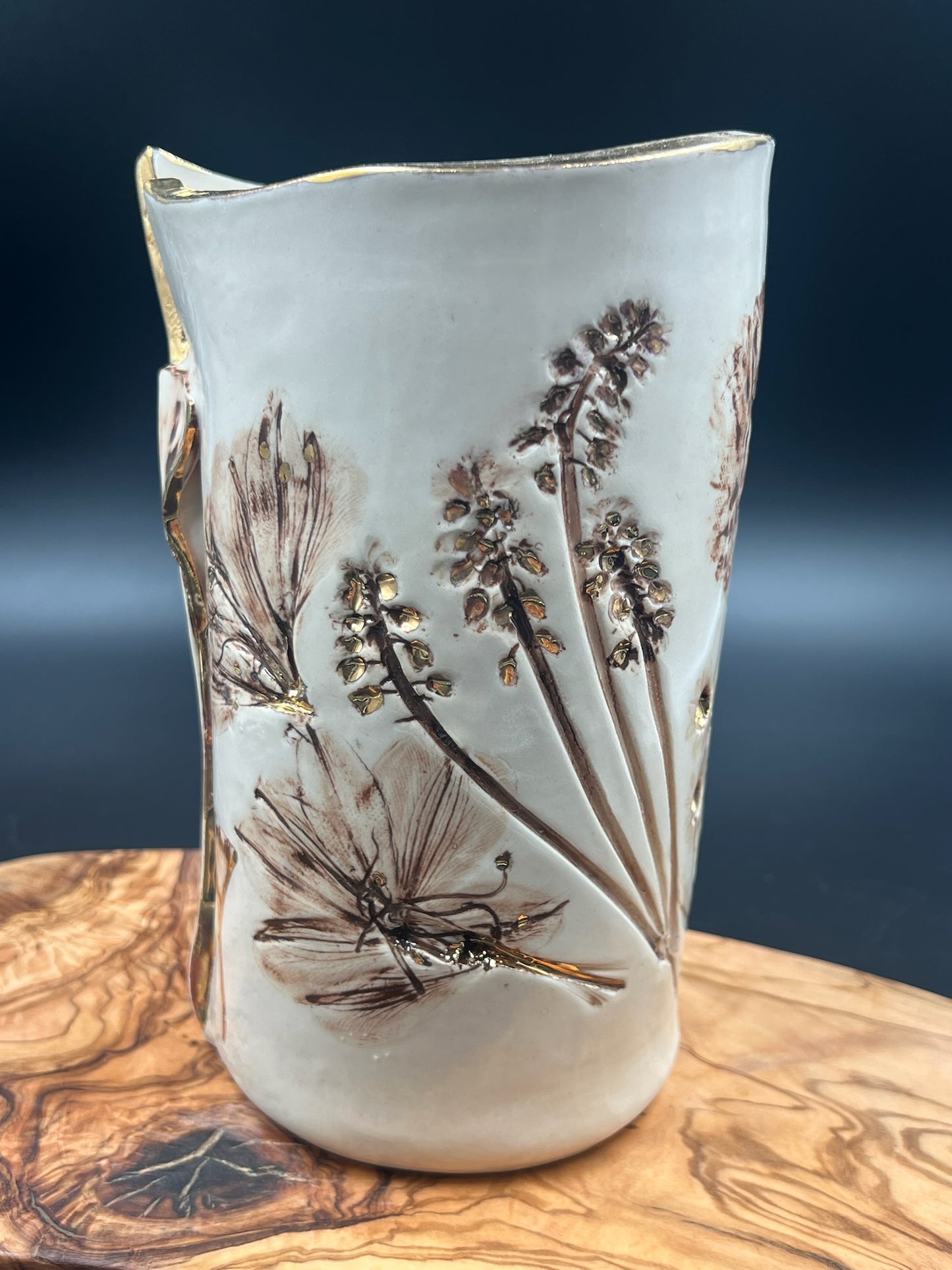 Sepia vase with sepia lace interior and gold rim