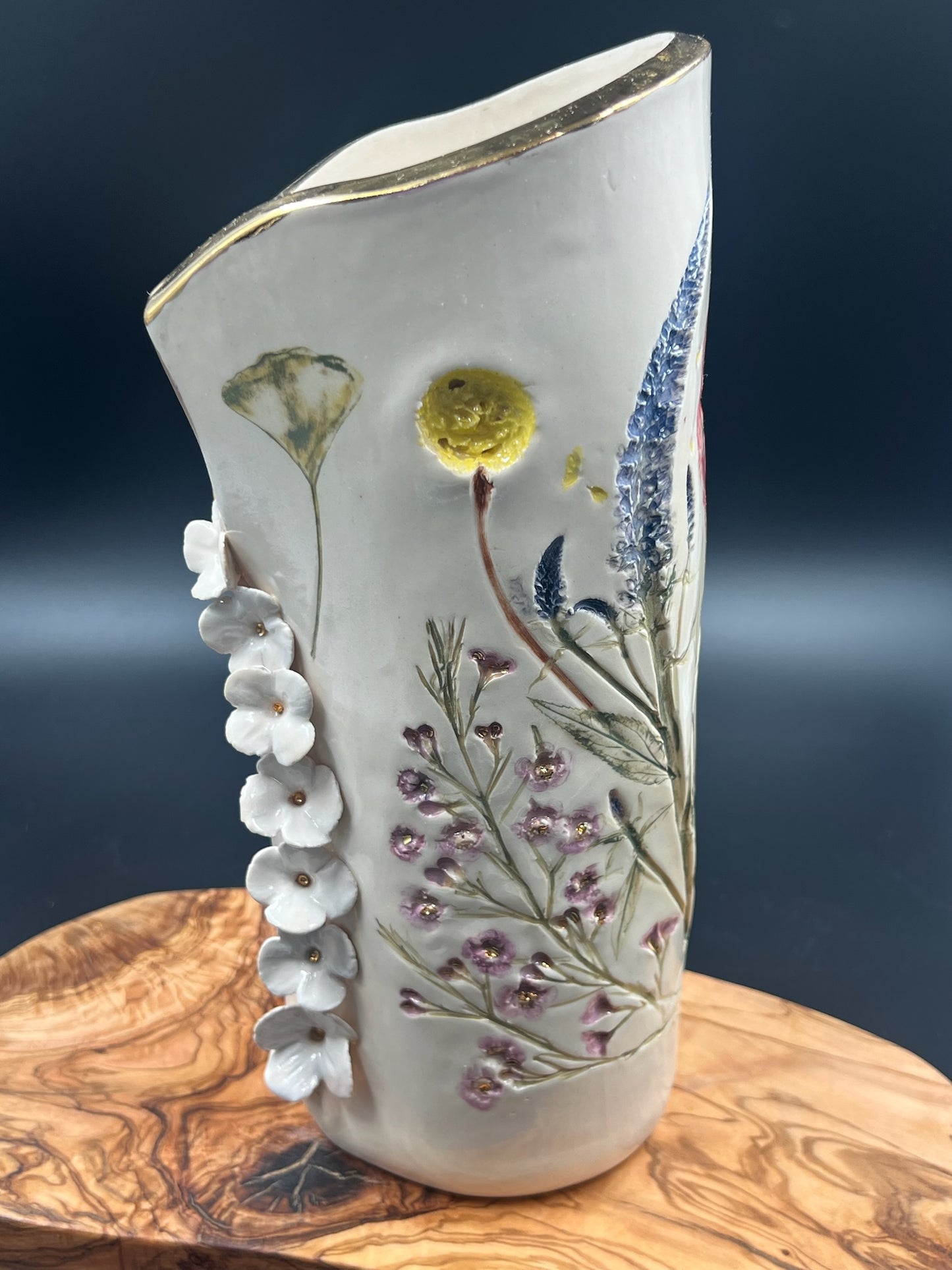 Color floral vase with cascading flowers, tall